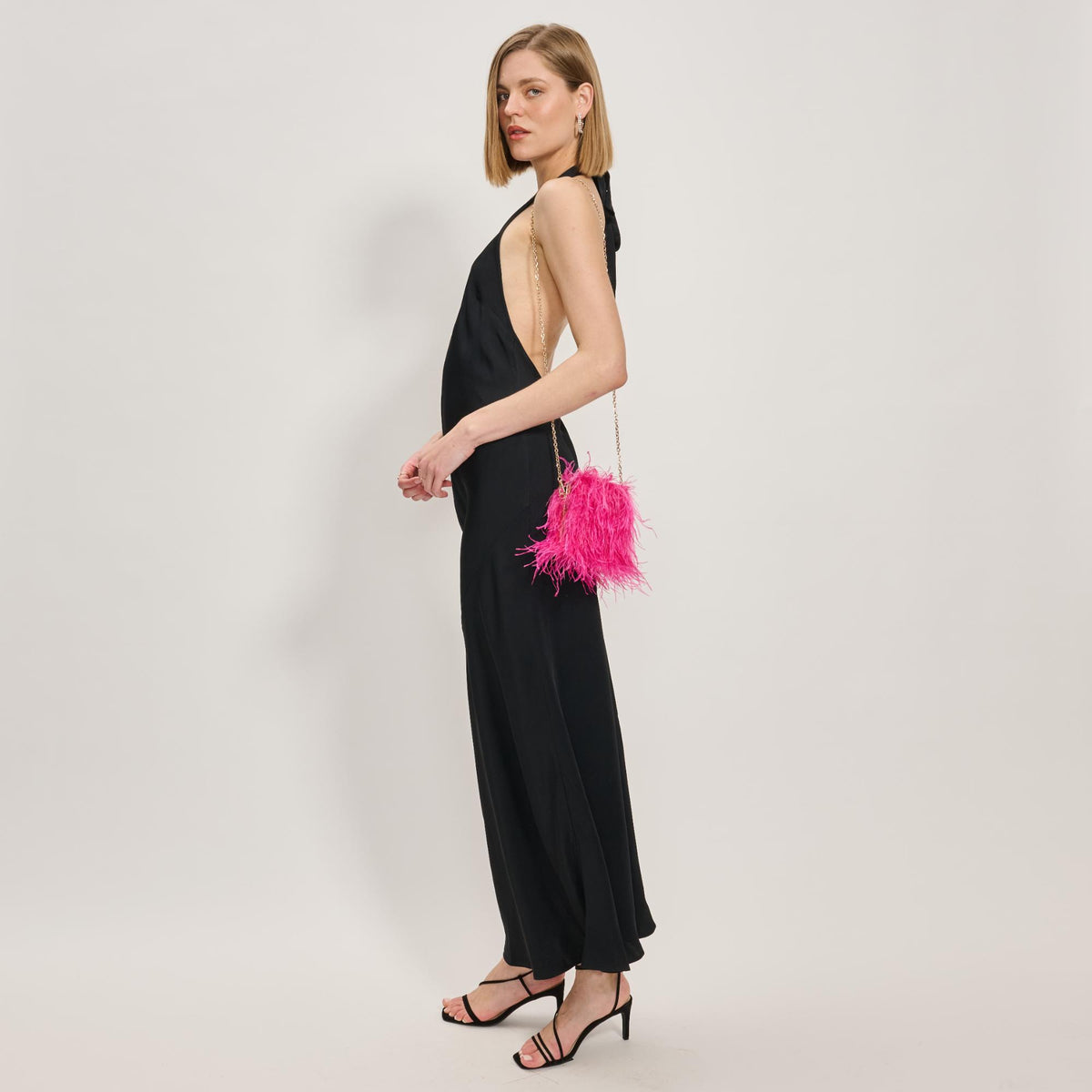 Woman wearing Hot Pink Sol and Selene Feathered Flair Evening Bag 842017138822 View 4 | Hot Pink