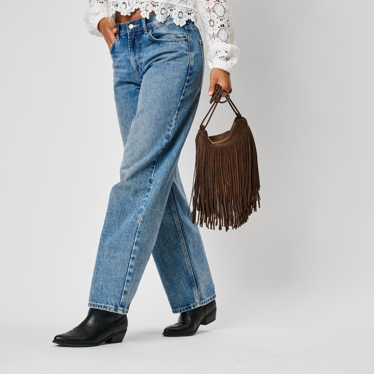Woman wearing Chocolate Moda Luxe Arizona Crossbody 842017142317 View 3 | Chocolate