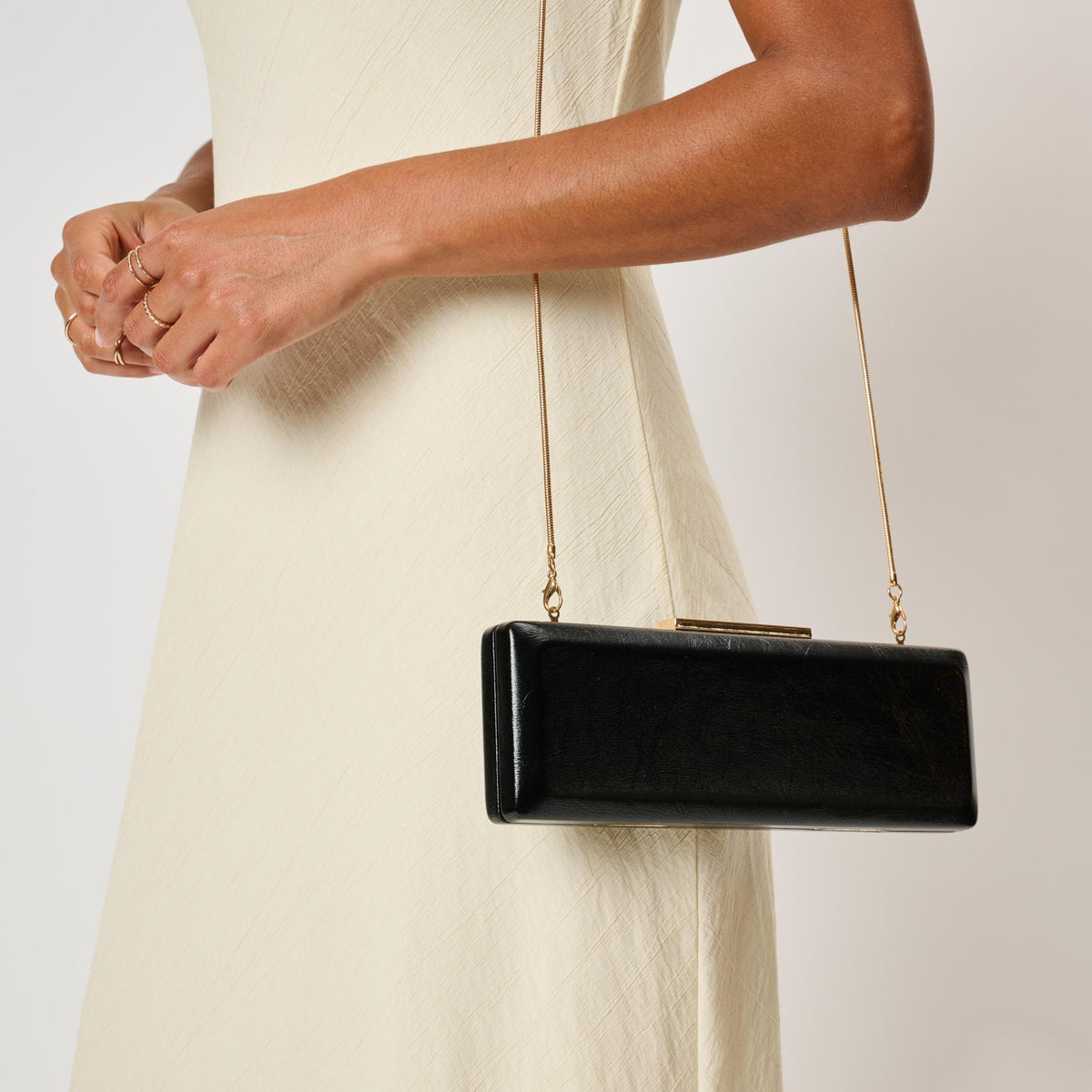 Woman wearing Black Moda Luxe Angie Clutch 842017142478 View 1 | Black