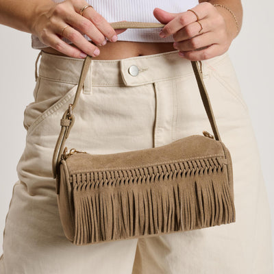 Woman wearing Sand Moda Luxe Emmi Shoulder Bag 842017140481 View 1 | Sand