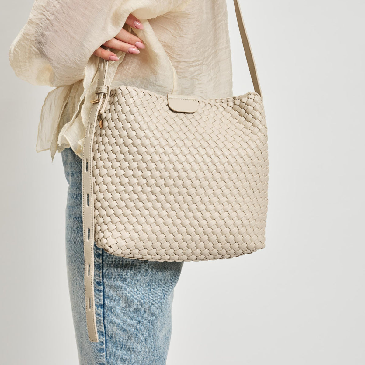 Woman wearing Ivory Sol and Selene Isadora Bucket 842017137337 View 4 | Ivory