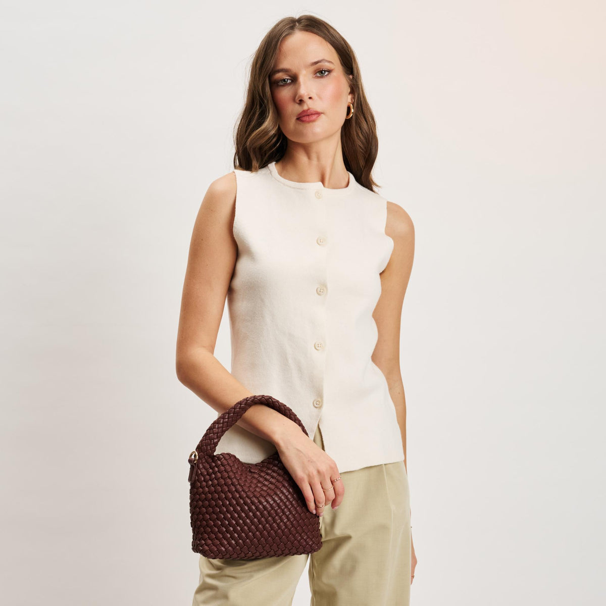 Woman wearing Chocolate Moda Luxe Jessamine Crossbody 842017141327 View 4 | Chocolate