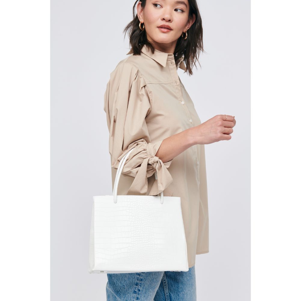 Woman wearing White Moda Luxe Pierce Mini Tote 842017125075 View 2 | White