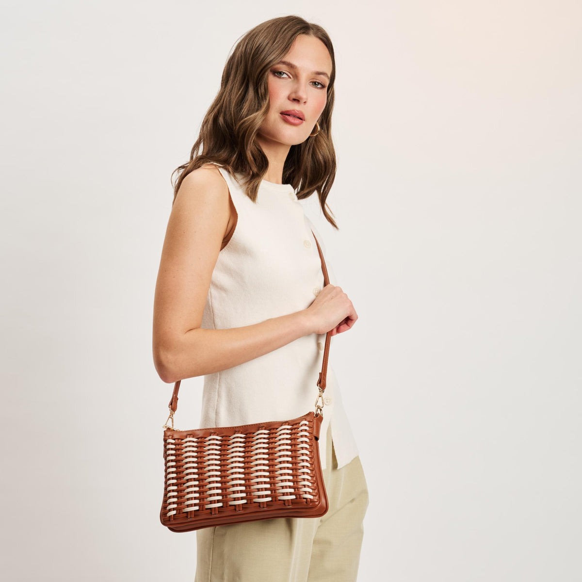 Woman wearing Tan Ivory Moda Luxe Maggie Crossbody 842017141280 View 3 | Tan Ivory