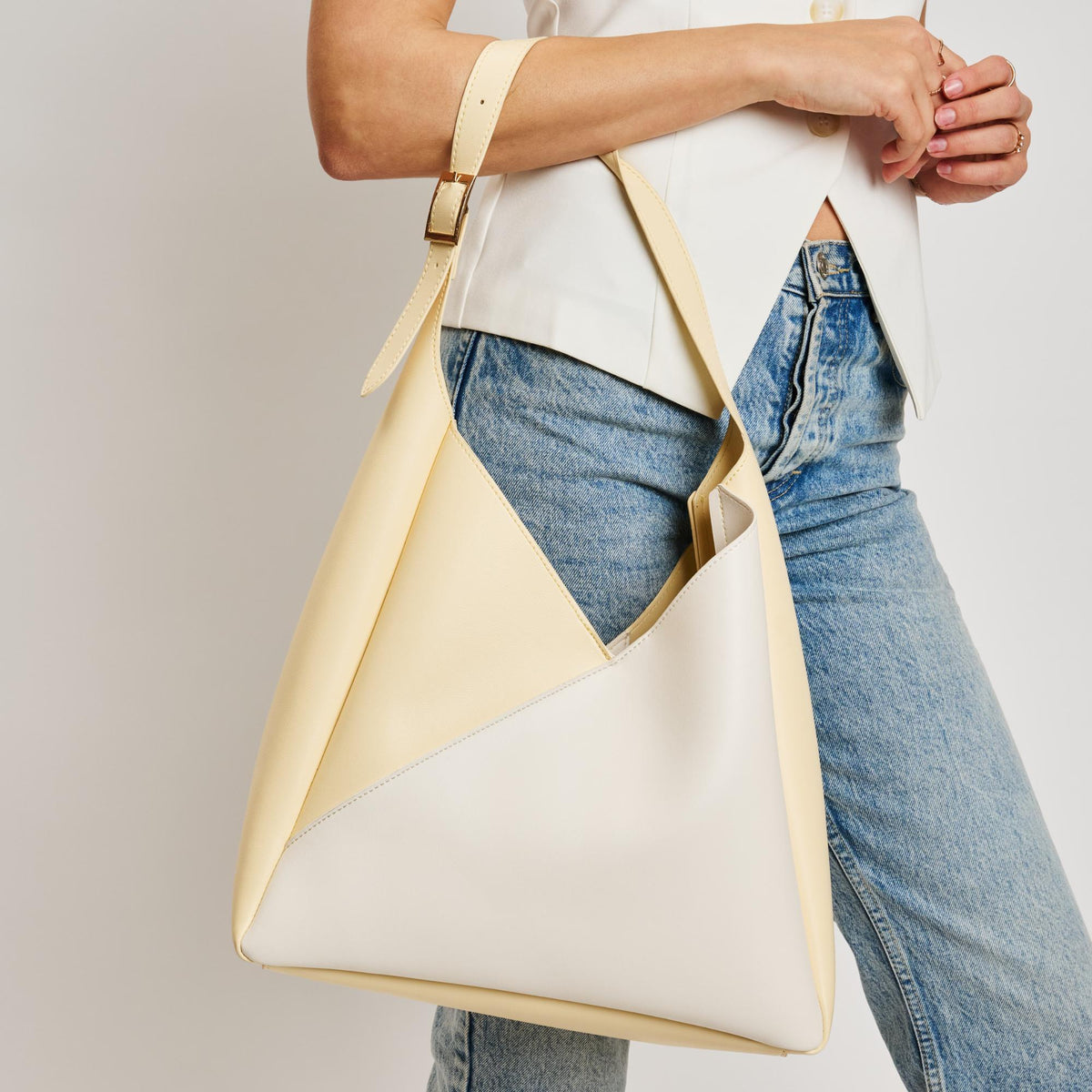 Woman wearing Ivory Butter Sol and Selene Frankie Hobo 842017138549 View 1 | Ivory Butter