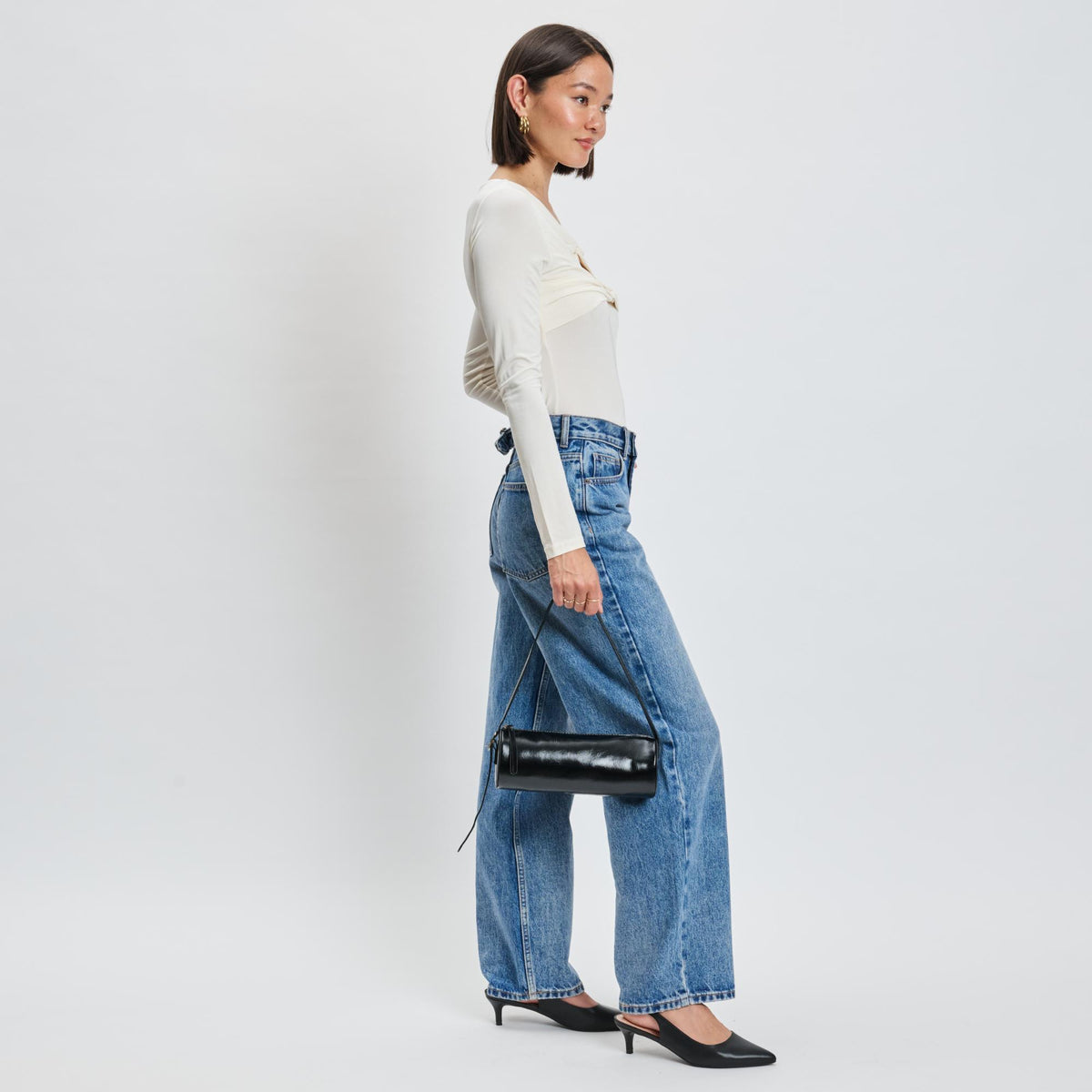 Woman wearing Black Moda Luxe Mila Shoulder Bag 842017139270 View 2 | Black