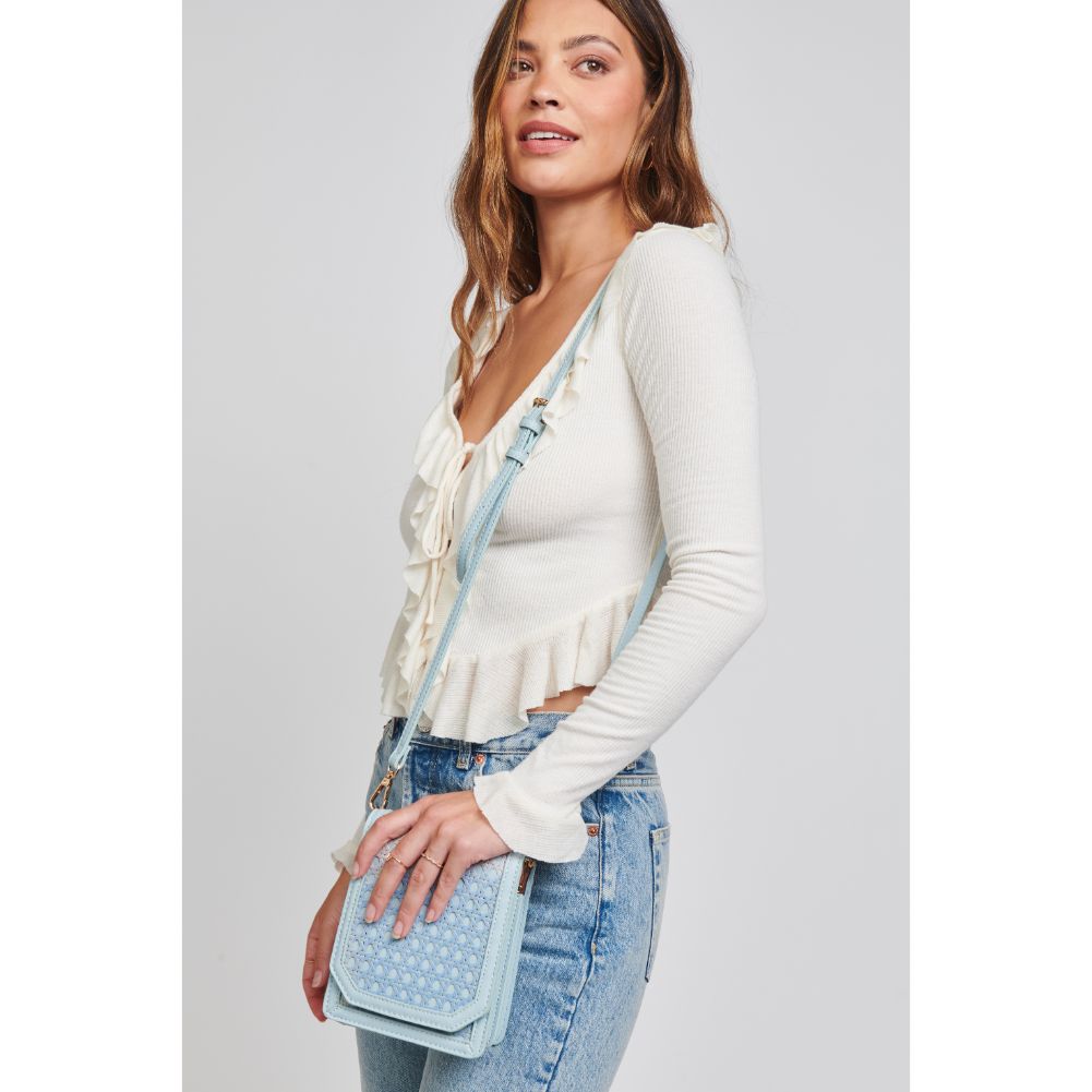Woman wearing Eggshell Blue Moda Luxe Remi Crossbody 842017124177 View 2 | Eggshell Blue