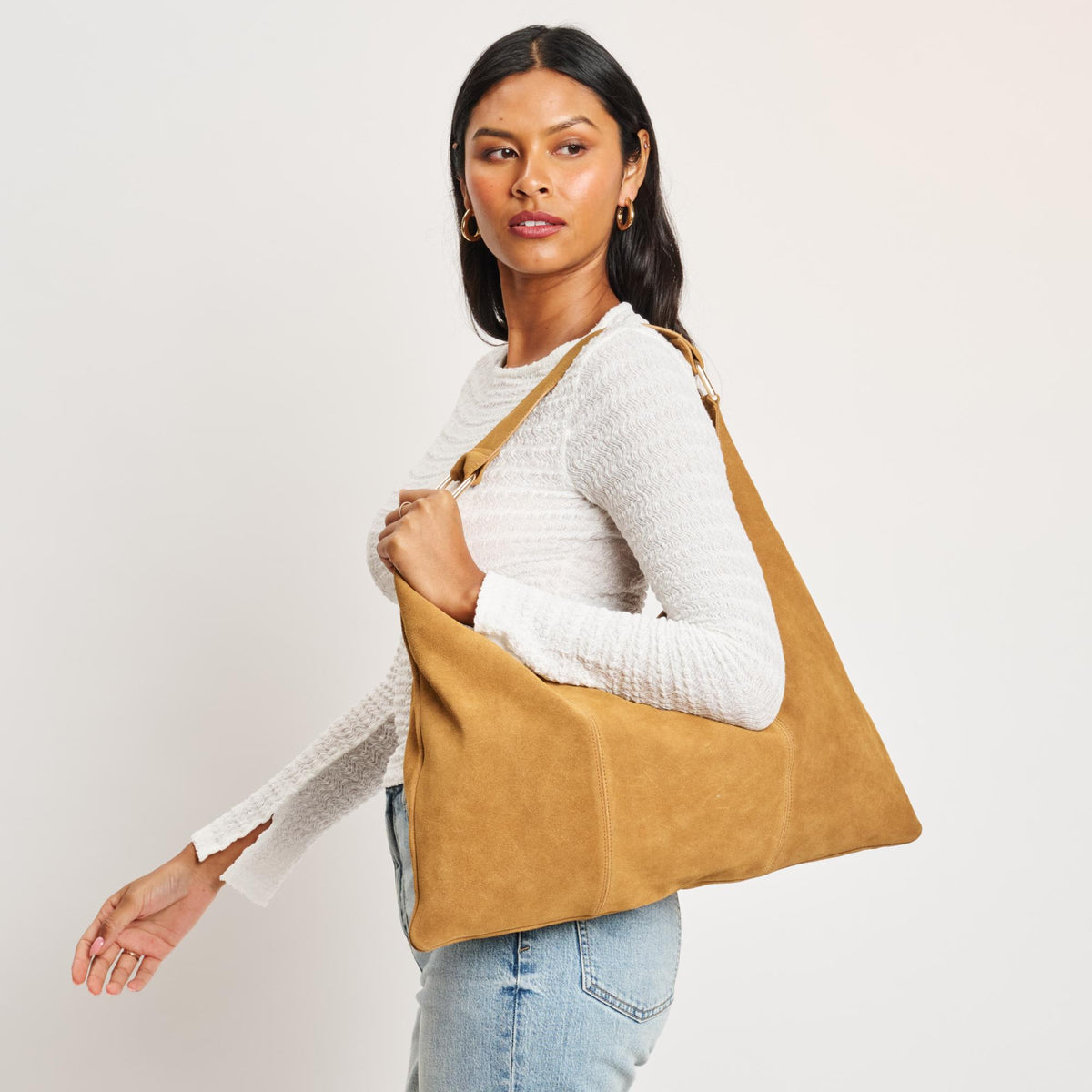 Woman wearing Tan Moda Luxe Indie Hobo 842017138938 View 1 | Tan