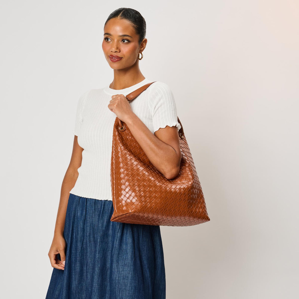 Woman wearing Cognac Moda Luxe Ezia Hobo 842017142744 View 1 | Cognac