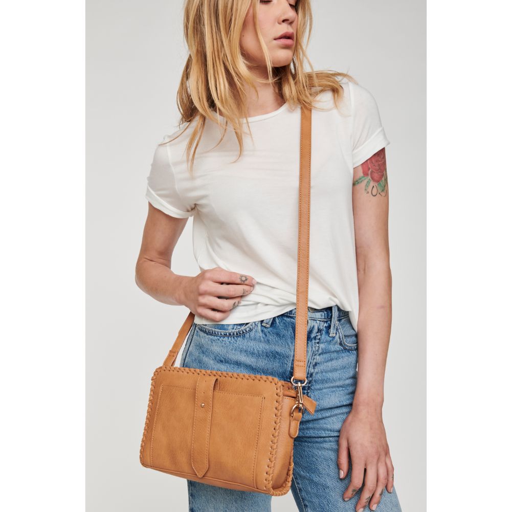 Woman wearing Tan Moda Luxe Andy Crossbody 842017119586 View 1 | Tan