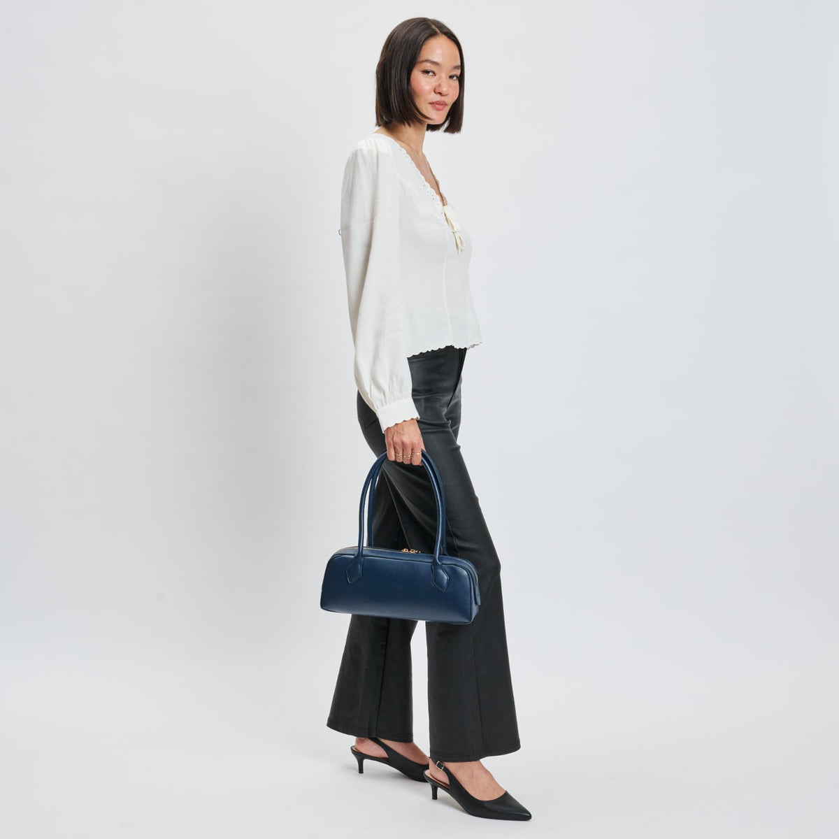 Woman wearing Midnight Moda Luxe Betty Shoulder Bag 842017139409 View 4 | Midnight