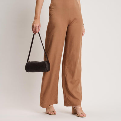 Woman wearing Chocolate Moda Luxe Mila - Straw Shoulder Bag 842017140689 View 1 | Chocolate