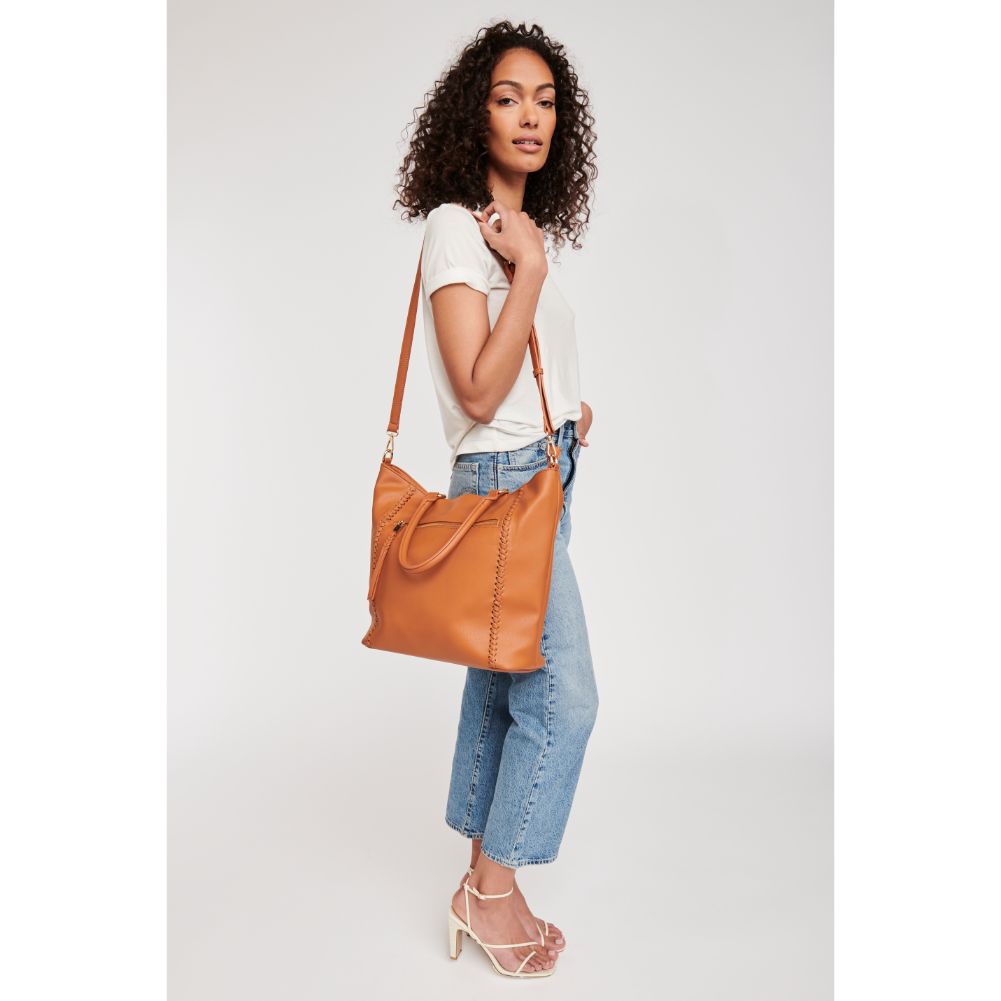 Woman wearing Tan Moda Luxe Jenna Crossbody 842017127406 View 3 | Tan