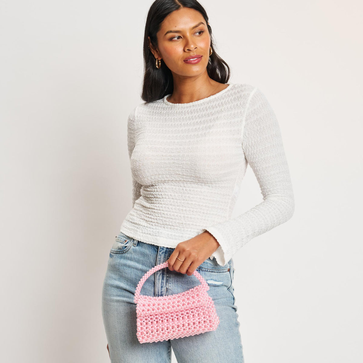 Woman wearing Pink Moda Luxe Darcy Evening Bag 842017132653 View 1 | Pink