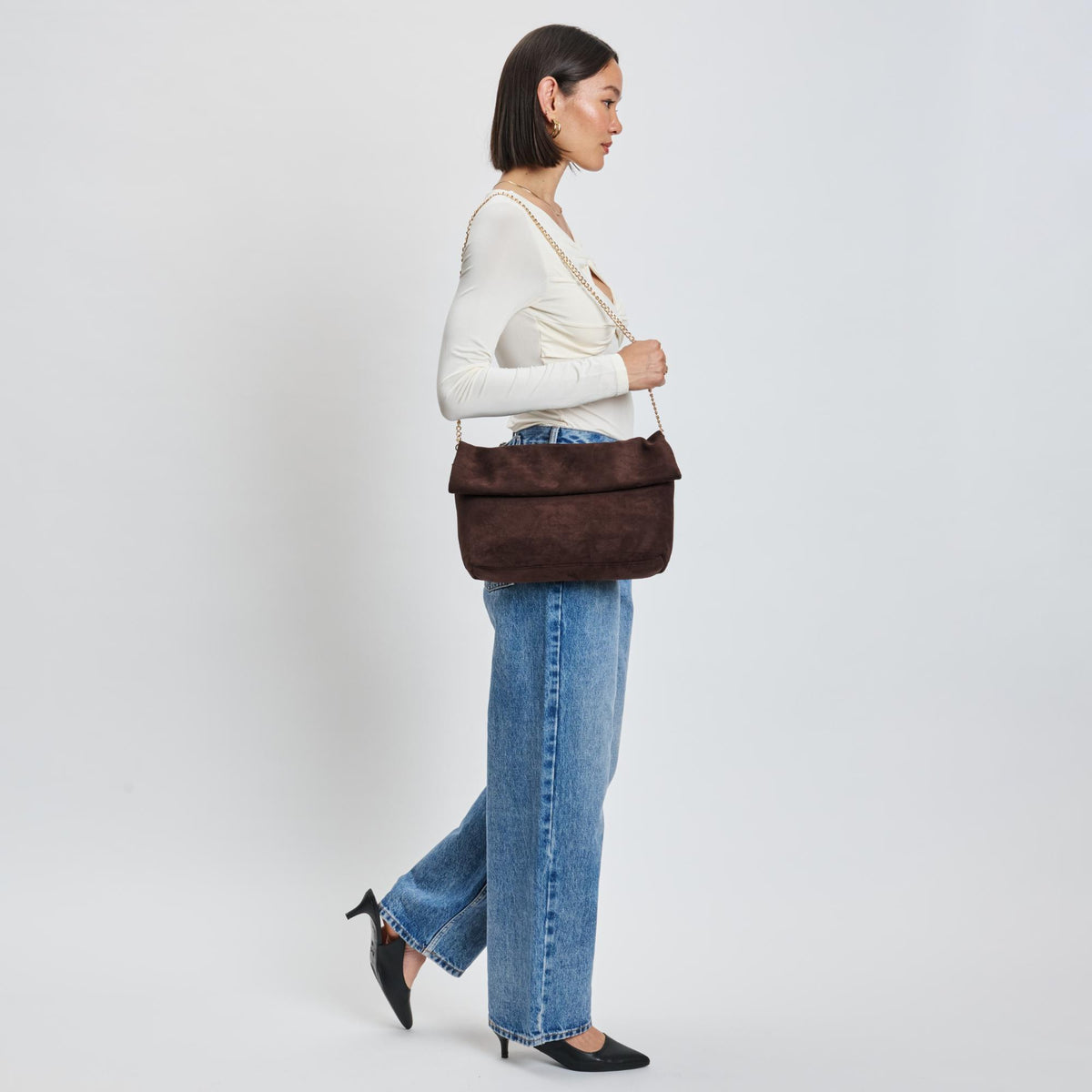 Woman wearing Chocolate Sol and Selene Zarae Crossbody 842017139997 View 2 | Chocolate