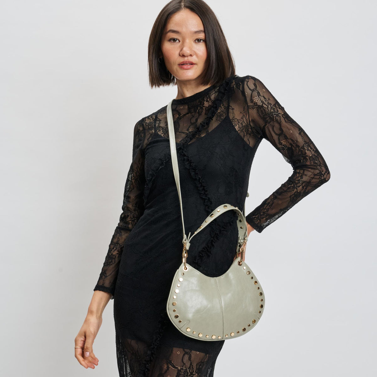 Woman wearing Sage Grey Moda Luxe Nova Crossbody 842017139652 View 2 | Sage Grey