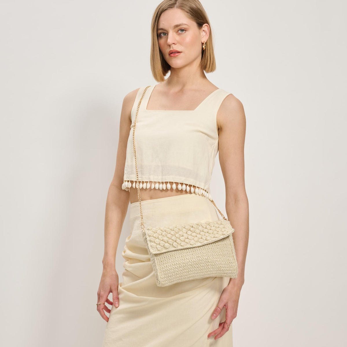 Woman wearing Ivory Moda Luxe Celeste Crossbody 842017137801 View 2 | Ivory