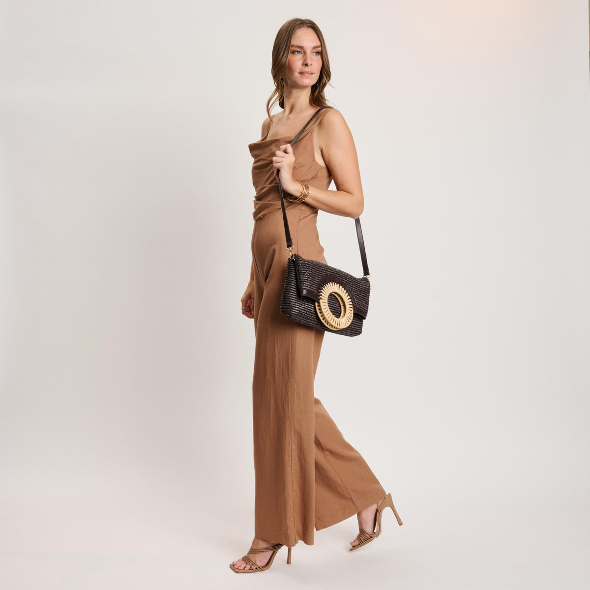 Woman wearing Chocolate Moda Luxe Tessa Crossbody 842017141198 View 2 | Chocolate