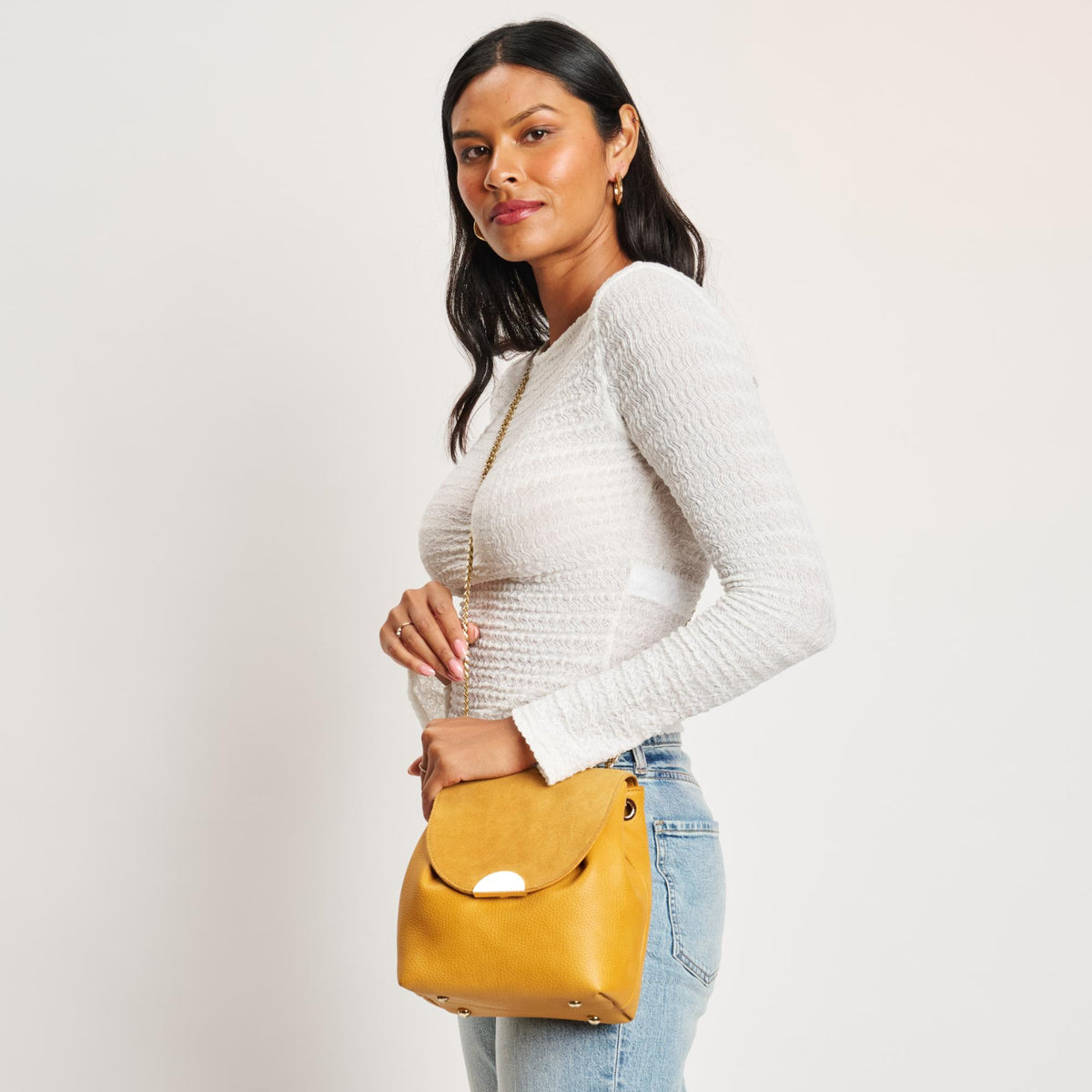 Woman wearing Mustard Moda Luxe Breanna Crossbody 842017127956 View 2 | Mustard