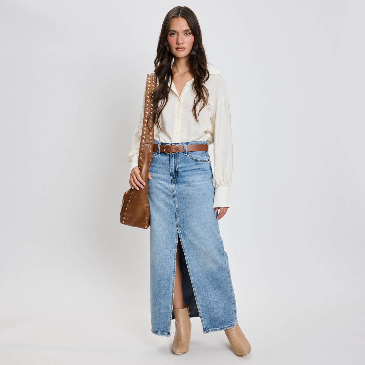 Woman wearing Chocolate Moda Luxe Electra Crossbody 842017136187 View 4 | Chocolate