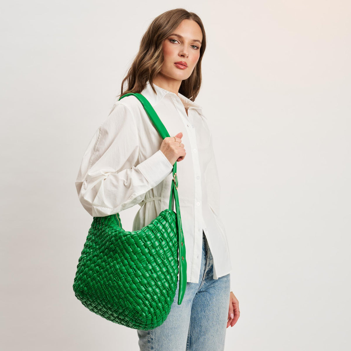 Woman wearing Kelly Green Moda Luxe Classica Crossbody 842017135500 View 1 | Kelly Green