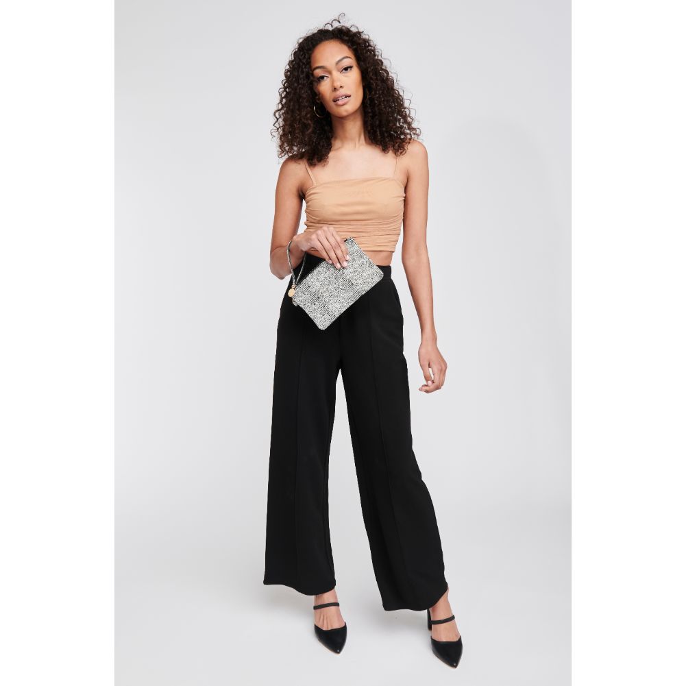 Woman wearing Black White Moda Luxe Olivia Wristlet 842017117957 View 2 | Black White