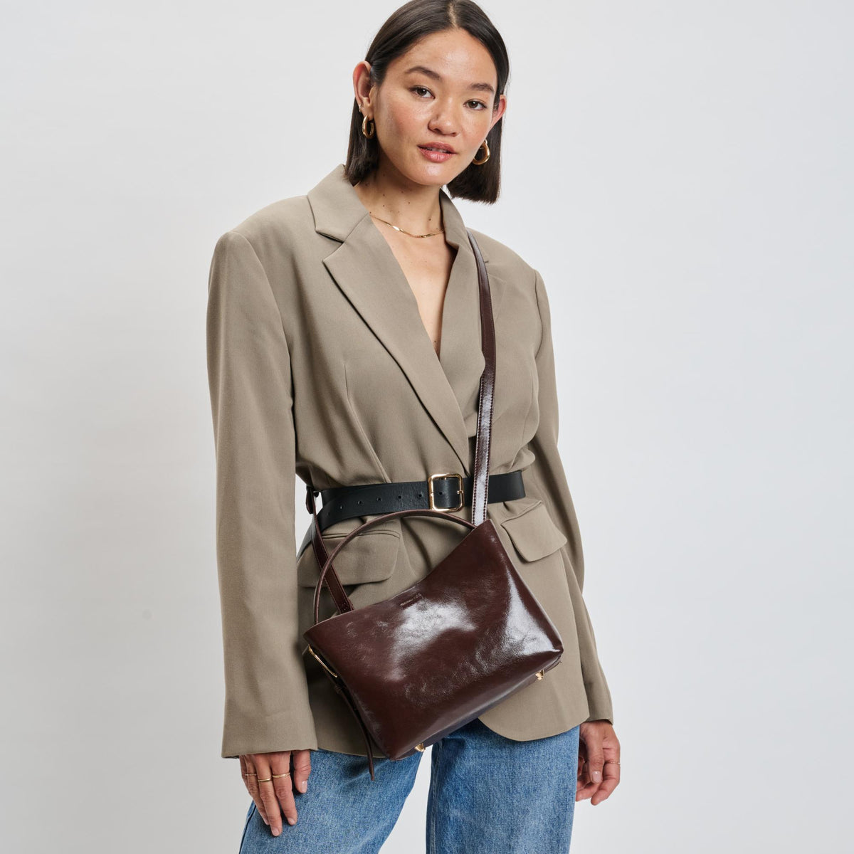Woman wearing Chocolate Moda Luxe Sophie Crossbody 842017139508 View 1 | Chocolate