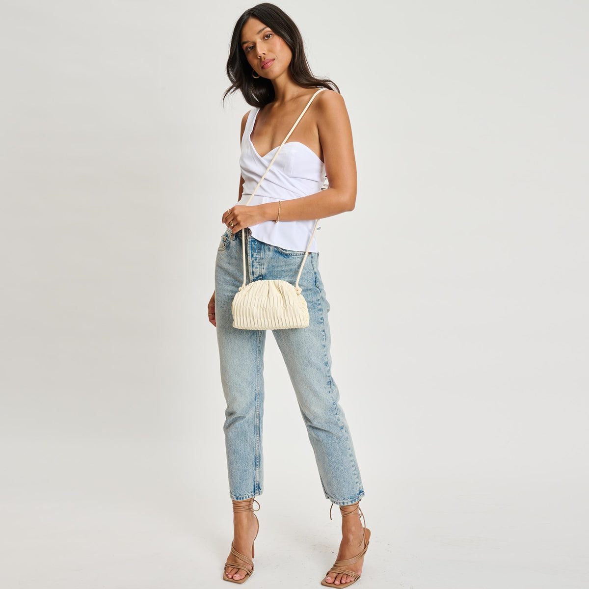 Woman wearing Oatmilk Sol and Selene Divaire Crossbody 842017135548 View 3 | Oatmilk
