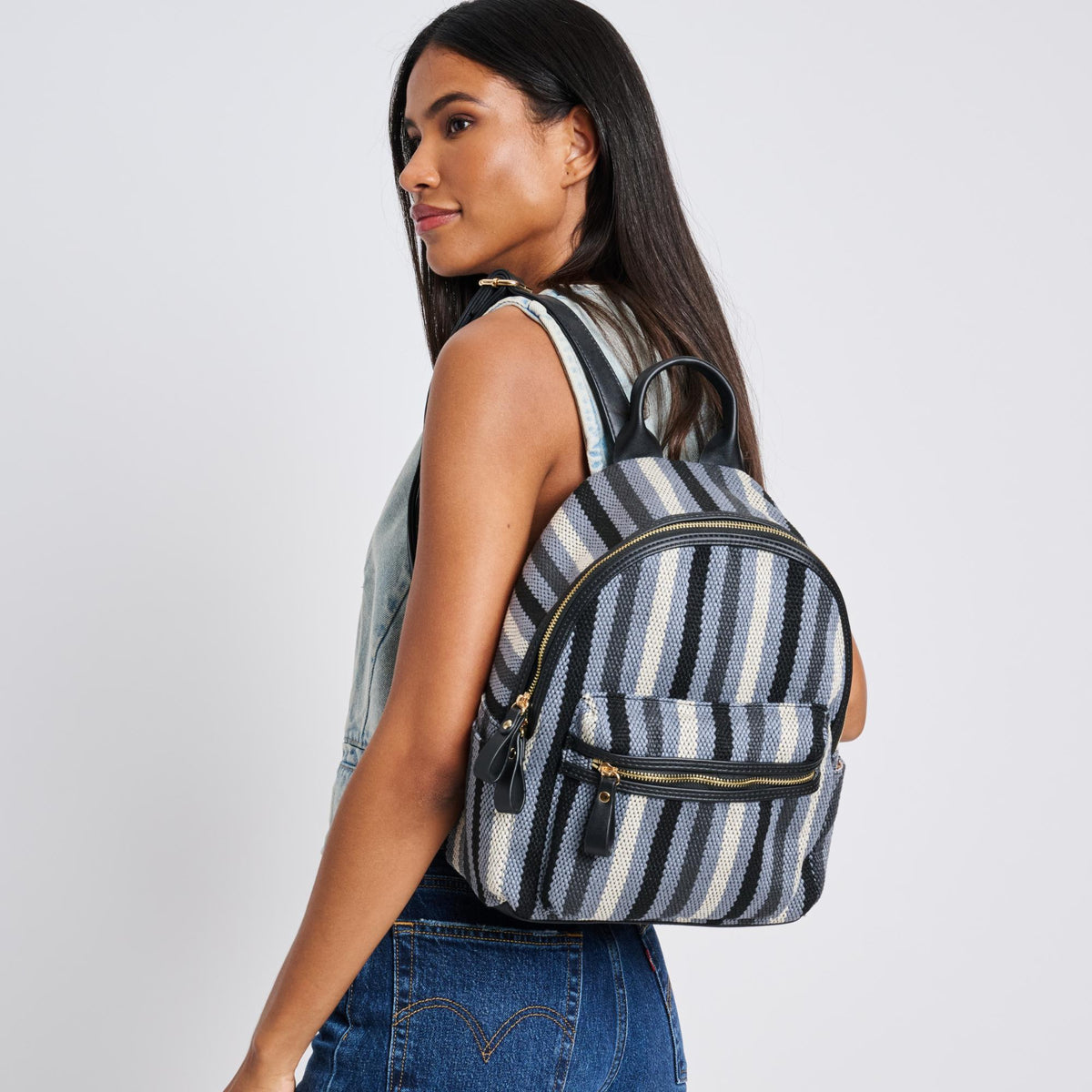 Woman wearing Black Moda Luxe Trent Backpack 842017124436 View 1 | Black