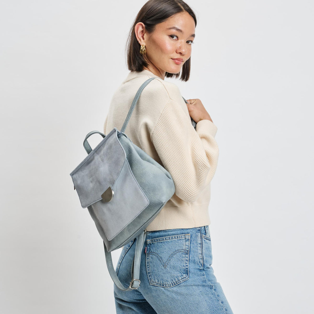 Woman wearing Light Blue Moda Luxe Lynn Backpack 842017139867 View 2 | Light Blue