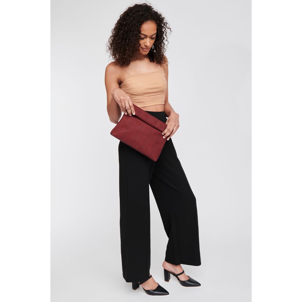 Woman wearing Red Moda Luxe Heather Clutch 842017116653 View 3 | Red