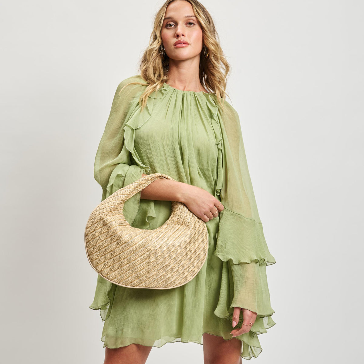 Woman wearing Gold Moda Luxe Farrah - Straw Hobo 842017138693 View 1 | Gold