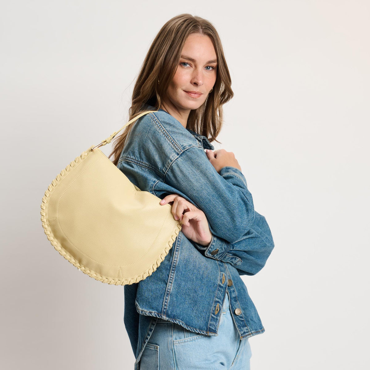 Woman wearing Butter Moda Luxe Lita Hobo 842017141099 View 3 | Butter