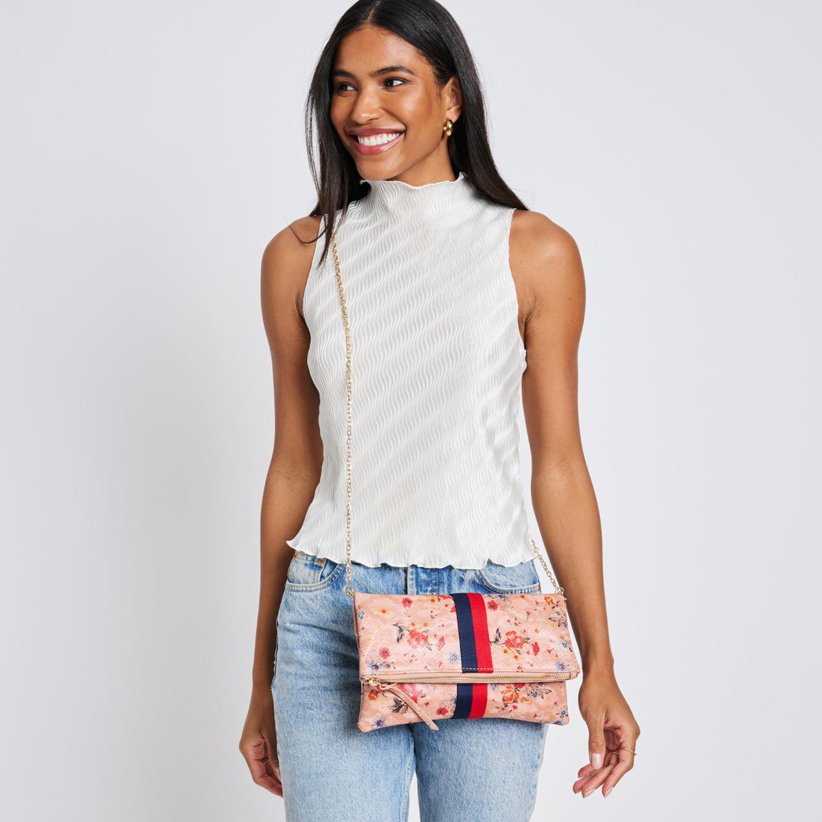 Woman wearing Blush Sol and Selene Jules Print Clutch 842017119425 View 3 | Blush