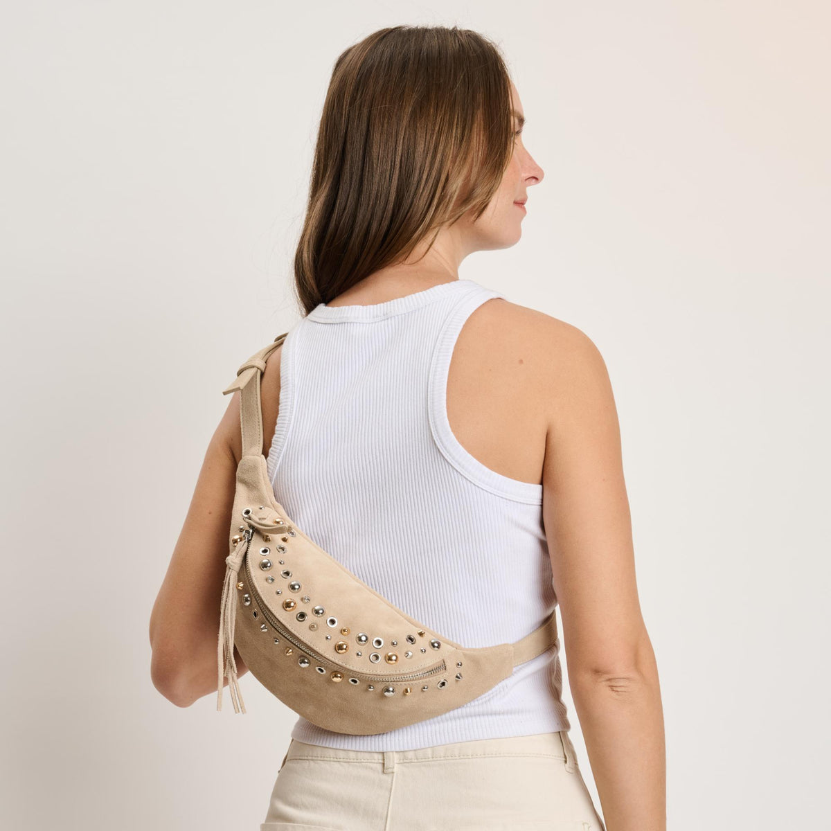 Woman wearing Natural Moda Luxe Star Belt Bag 842017140627 View 3 | Natural