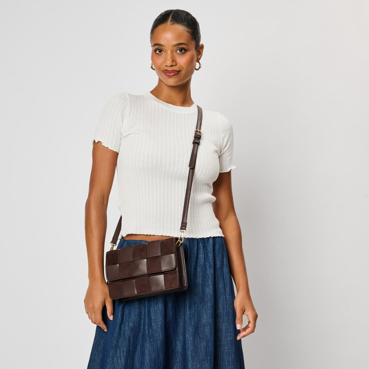 Woman wearing Chocolate Moda Luxe Tanya Crossbody 842017142904 View 2 | Chocolate