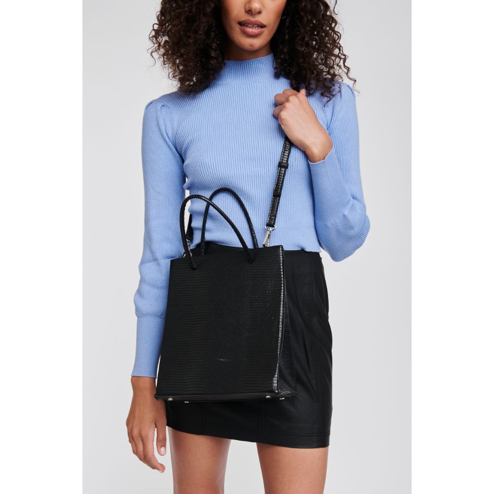 Woman wearing Black Moda Luxe Piper Tote 842017125143 View 1 | Black