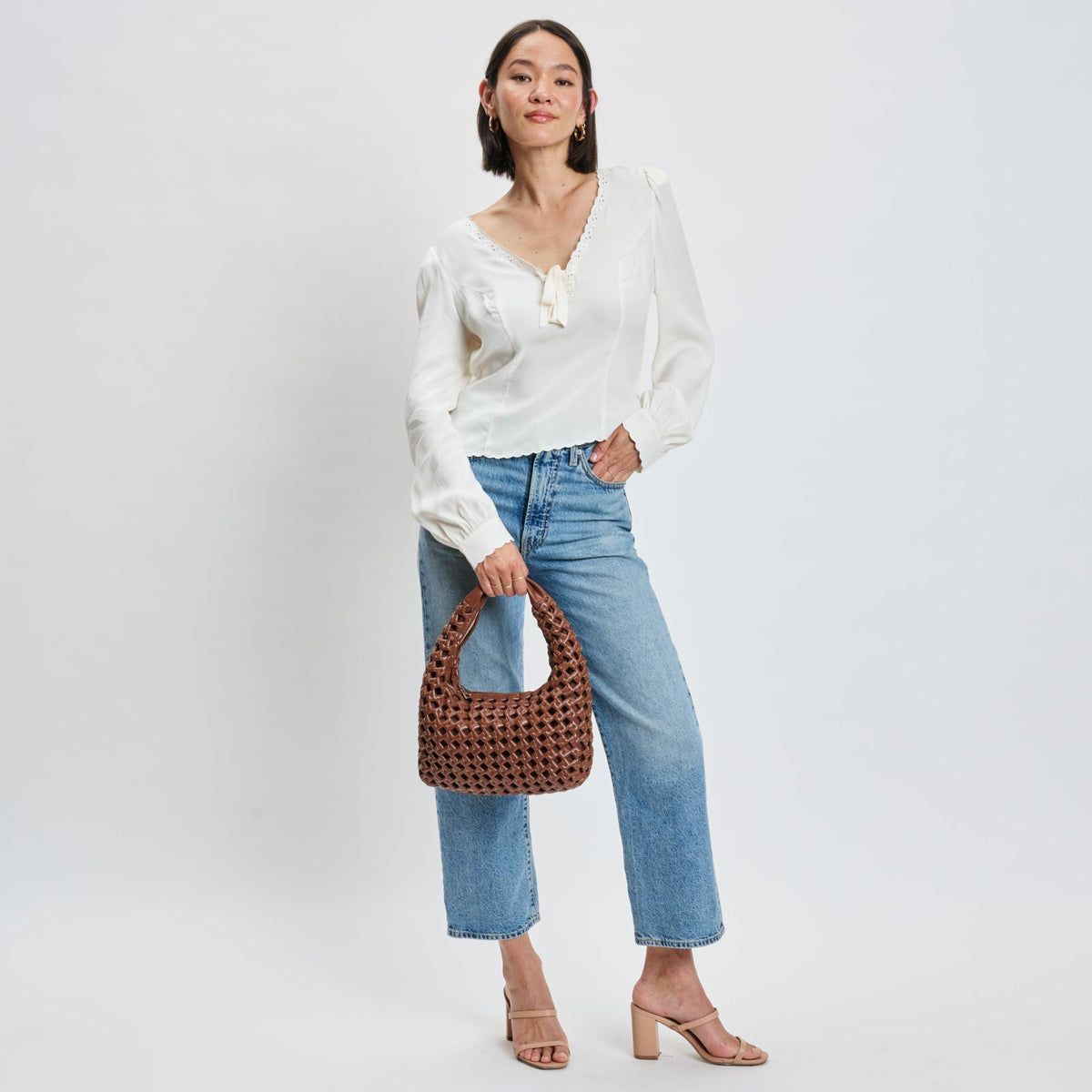 Woman wearing Chocolate Moda Luxe Richelle Hobo 842017137542 View 3 | Chocolate