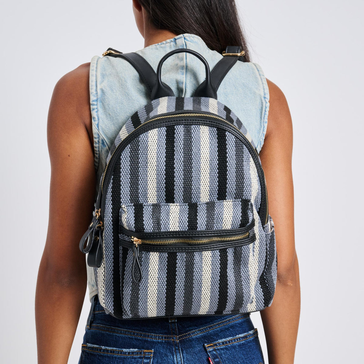 Woman wearing Black Moda Luxe Trent Backpack 842017124436 View 2 | Black