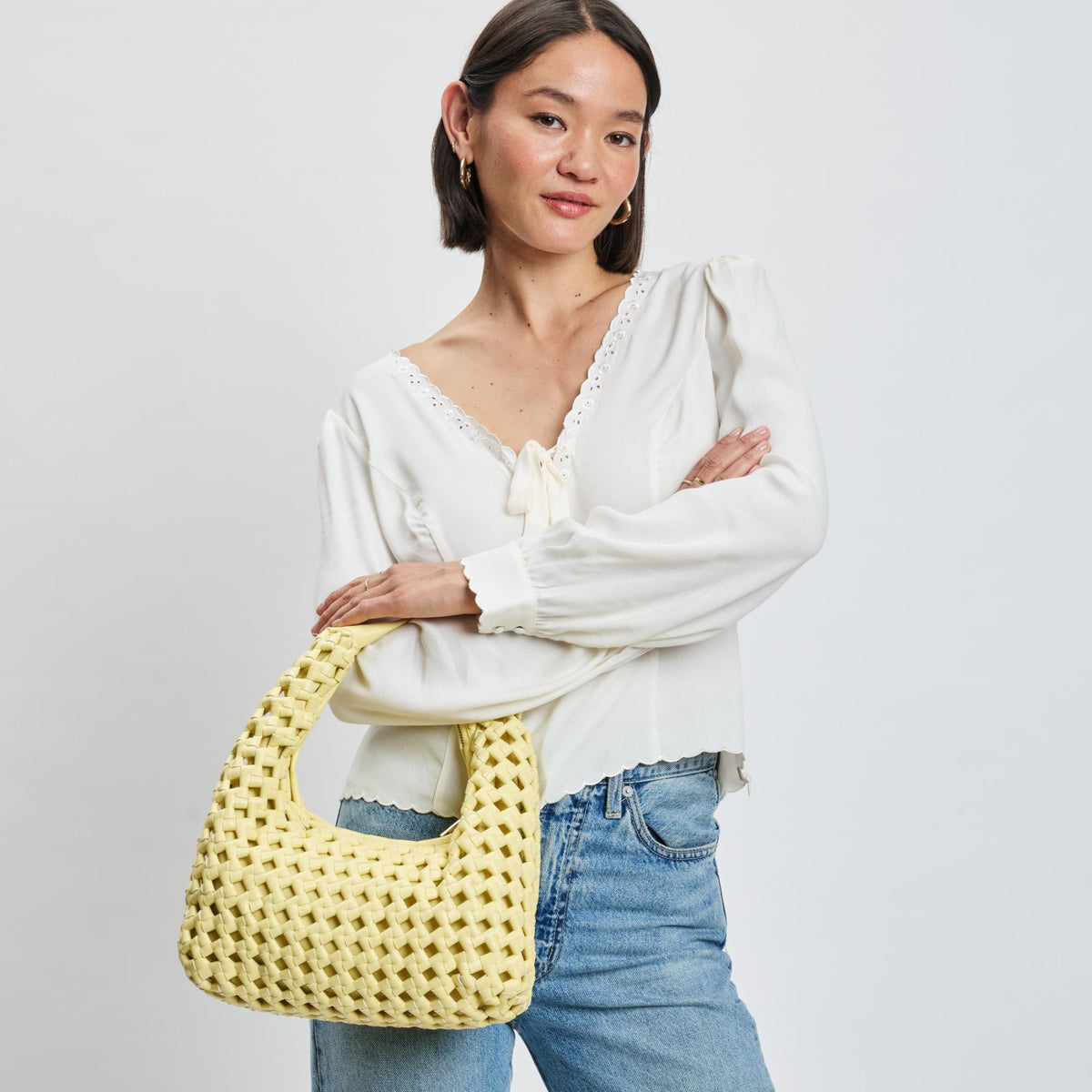 Woman wearing Butter Moda Luxe Richelle Hobo 842017137535 View 1 | Butter
