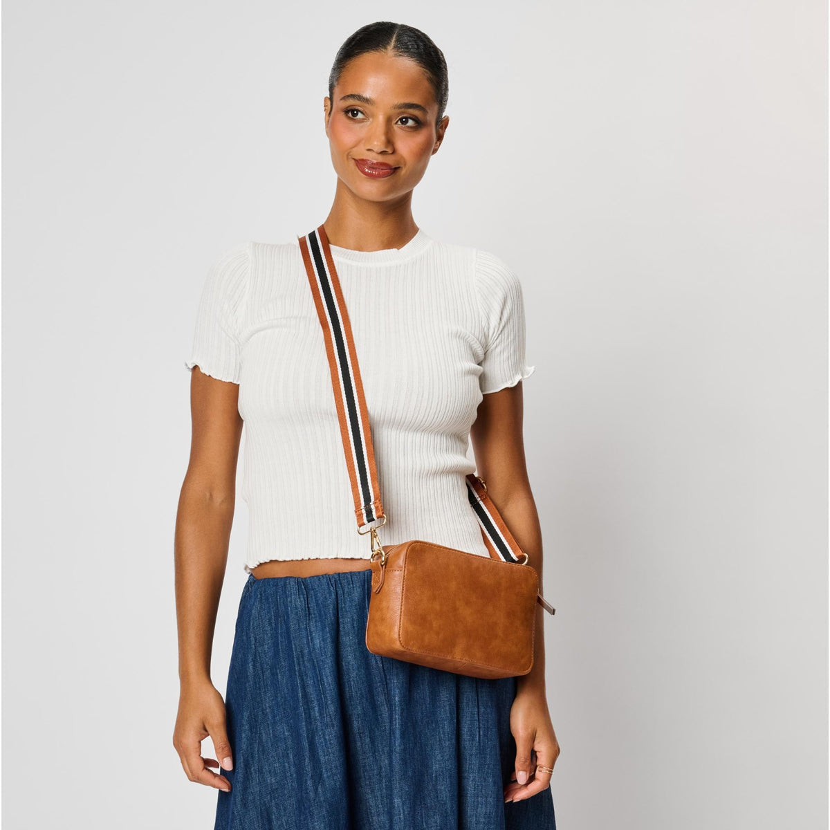 Woman wearing Tan Moda Luxe Skylie Crossbody 842017126706 View 1 | Tan