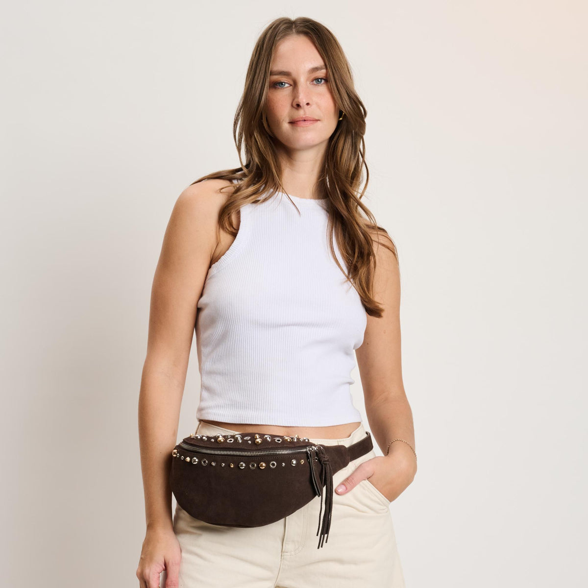 Woman wearing Chocolate Moda Luxe Star Belt Bag 842017140603 View 4 | Chocolate
