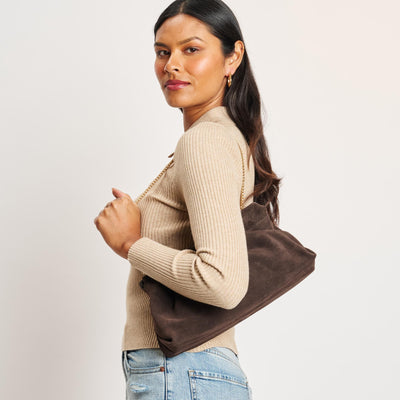 Woman wearing Chocolate Moda Luxe Penelope Shoulder Bag 842017139126 View 2 | Chocolate