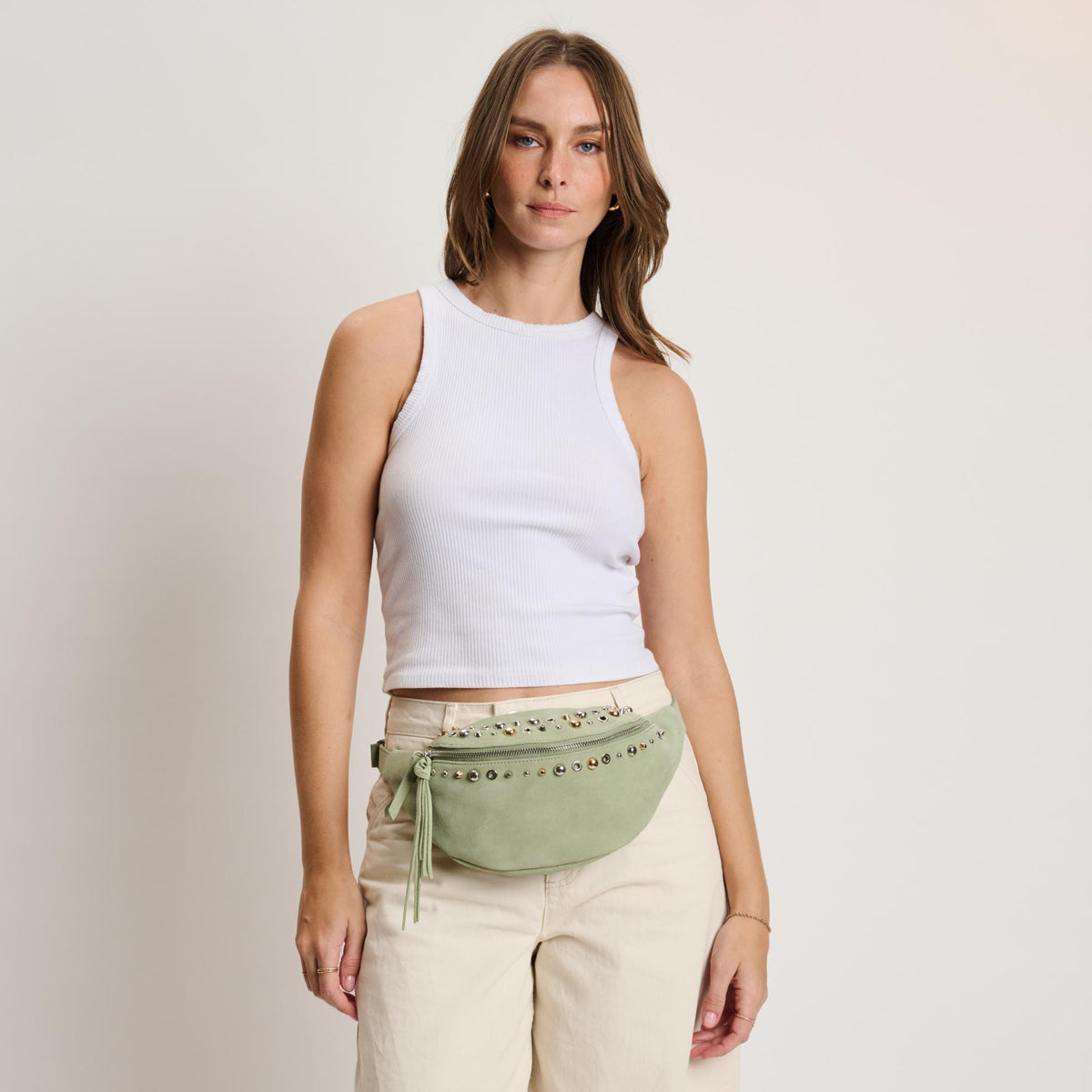 Woman wearing Sage Moda Luxe Star Belt Bag 842017140610 View 4 | Sage