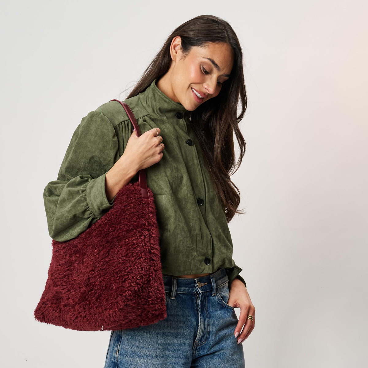 Woman wearing Burgundy Moda Luxe Neve Sherpa Tote 842017142447 View 1 | Burgundy