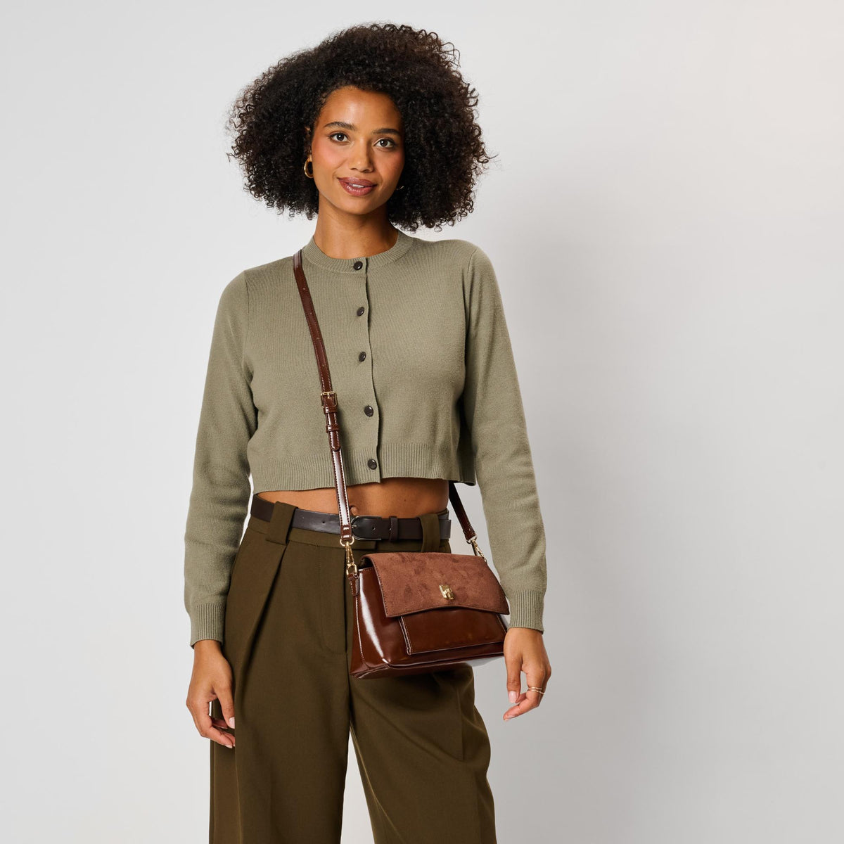 Woman wearing Chocolate Moda Luxe Aly Crossbody 842017143048 View 2 | Chocolate