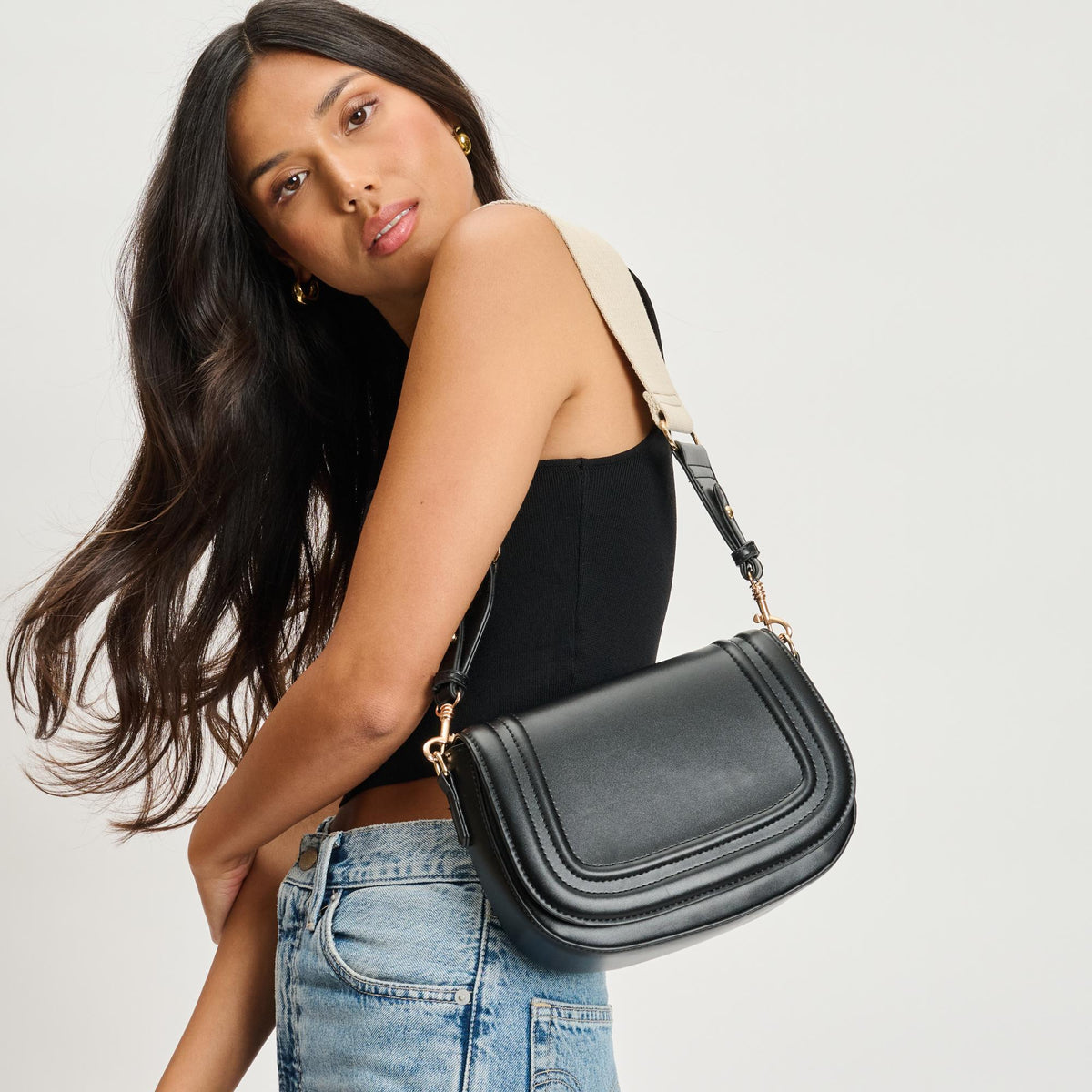 Woman wearing Black Moda Luxe Poshette Crossbody 842017134732 View 2 | Black