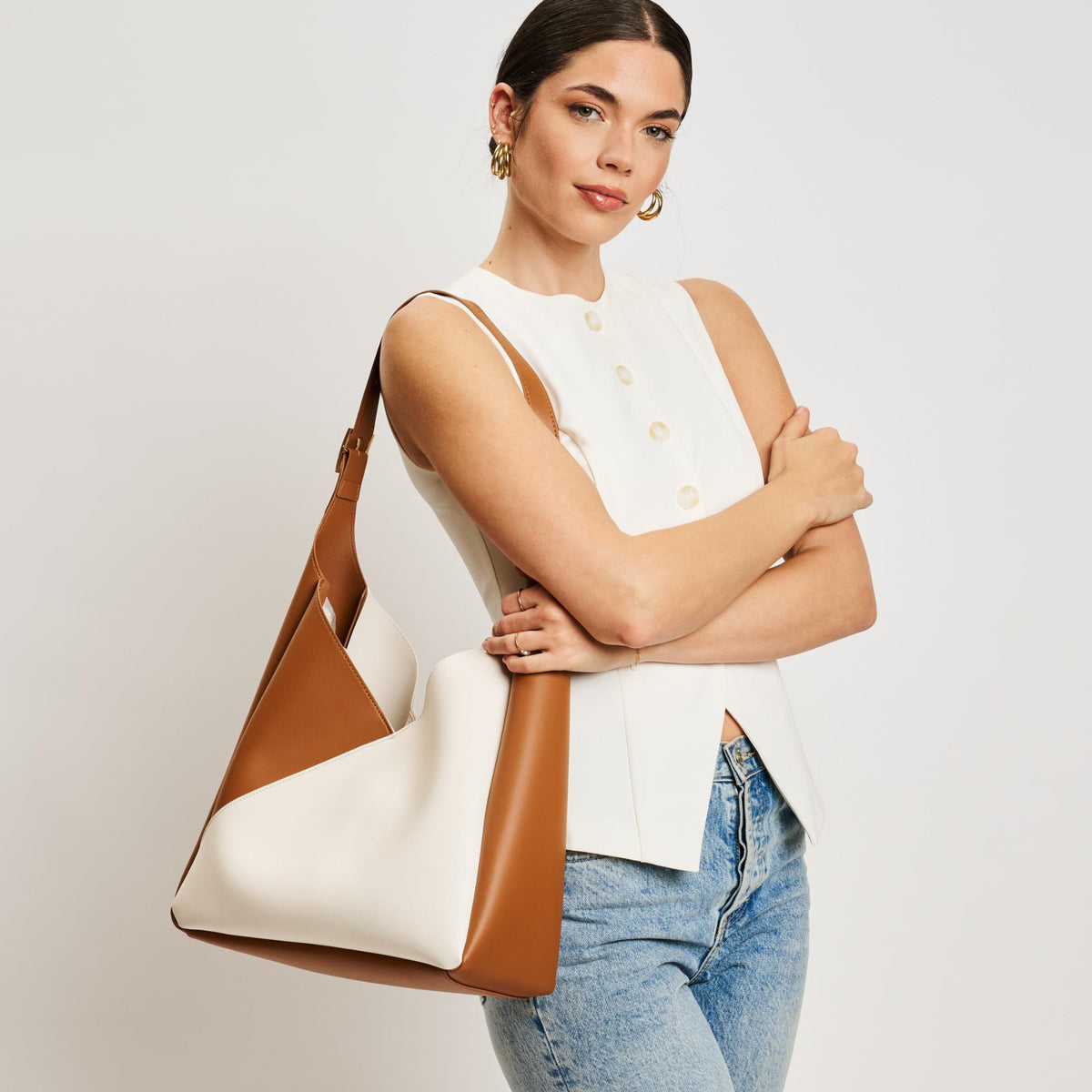Woman wearing Ivory Tan Sol and Selene Frankie Hobo 842017138532 View 1 | Ivory Tan