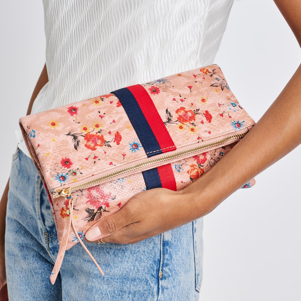 Woman wearing Blush Sol and Selene Jules Print Clutch 842017119425 View 1 | Blush