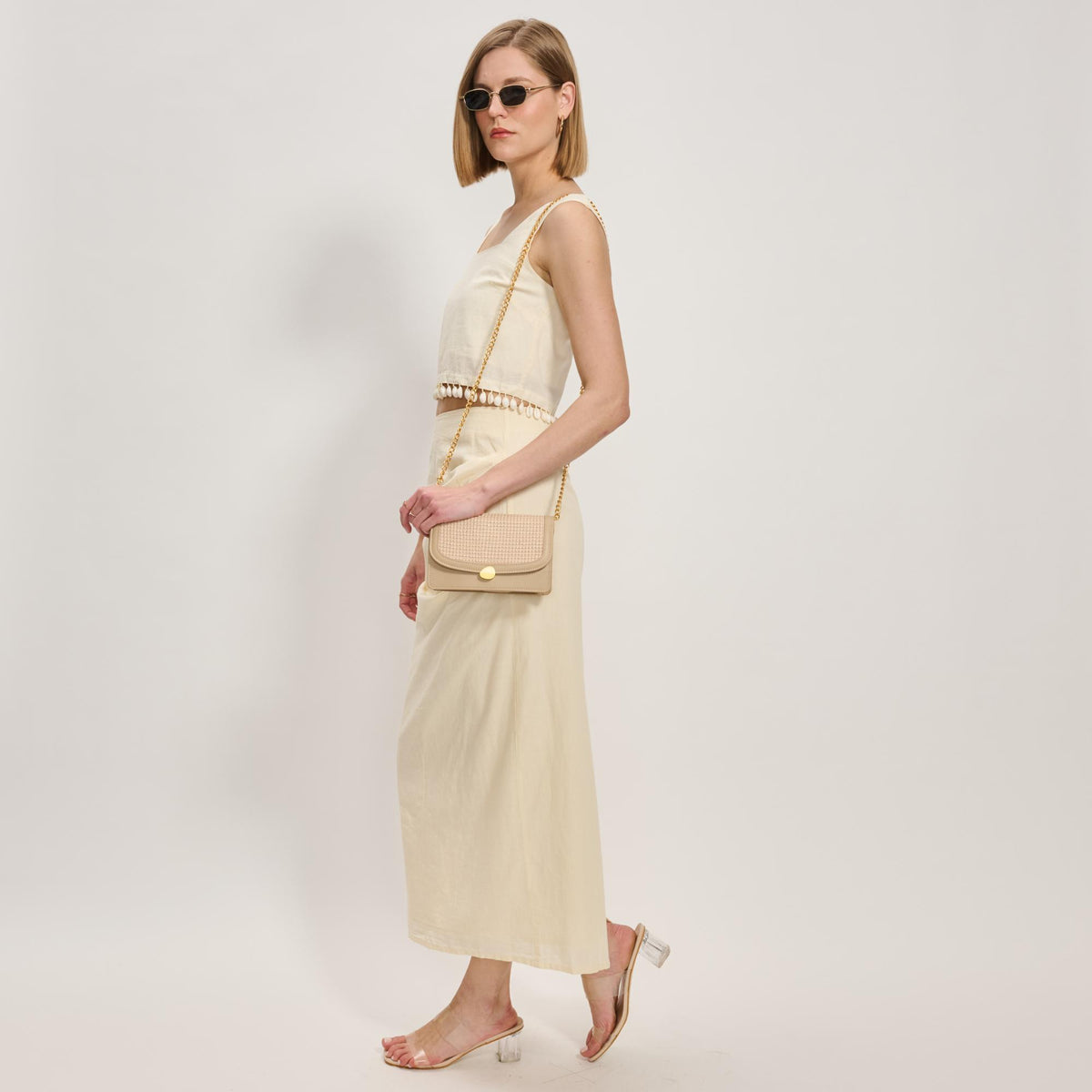 Woman wearing Cream Moda Luxe Nina Crossbody 842017137177 View 2 | Cream